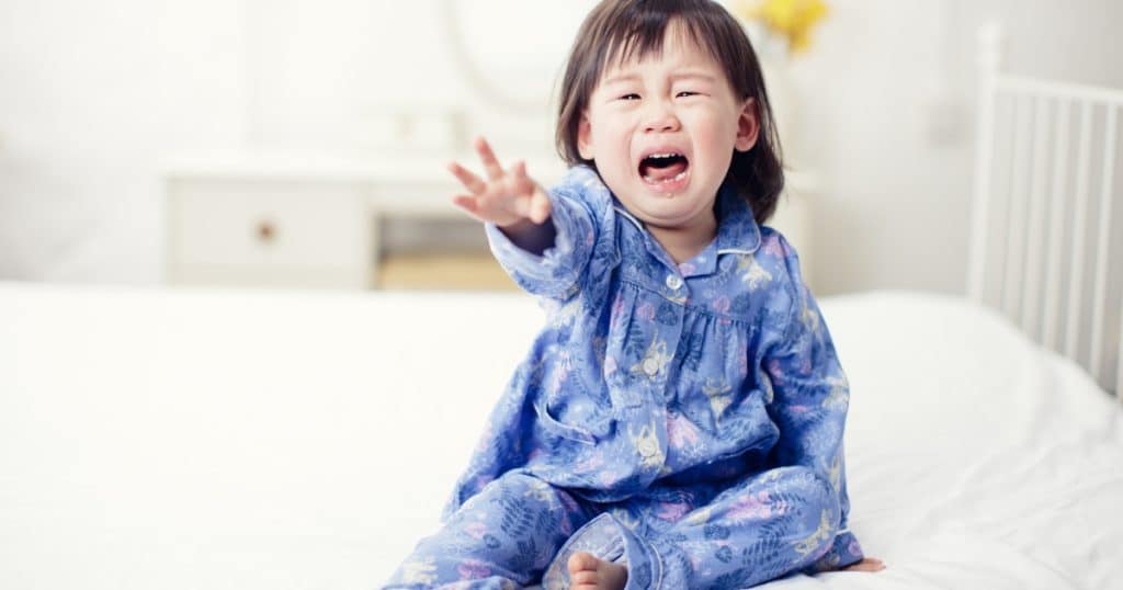 Little girl crying https://www.autismparentingmagazine.com/autism-touch-aversion/