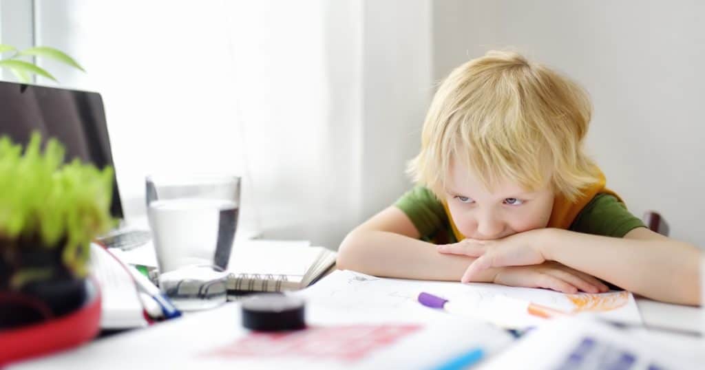 Boy refusing to do his homework https://www.autismparentingmagazine.com/pda-vs-odd/