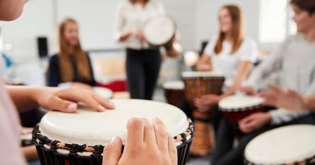 Teens in music therapy https://www.autismparentingmagazine.com/activities-for-teens-with-autism/