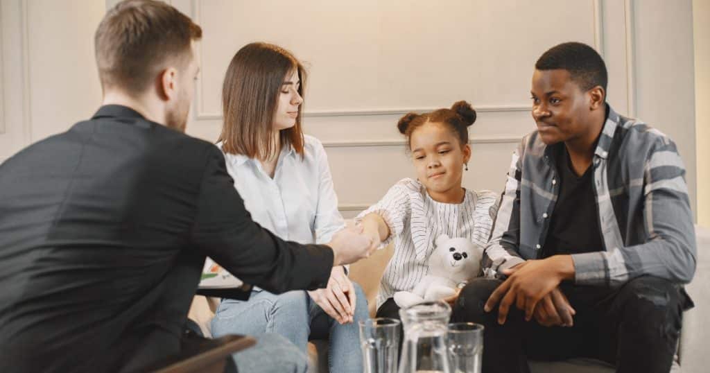 When to seek professional help Parents meeting a therapist for their daughter https://www.autismparentingmagazine.com/autism-behavior-red-flags/
