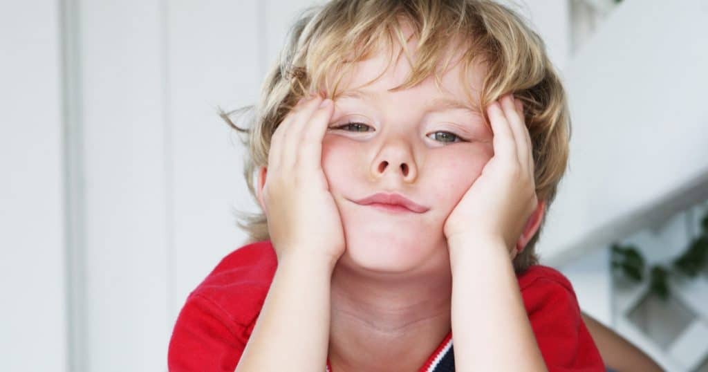 Little boy looking bored https://www.autismparentingmagazine.com/autism-and-boredom/